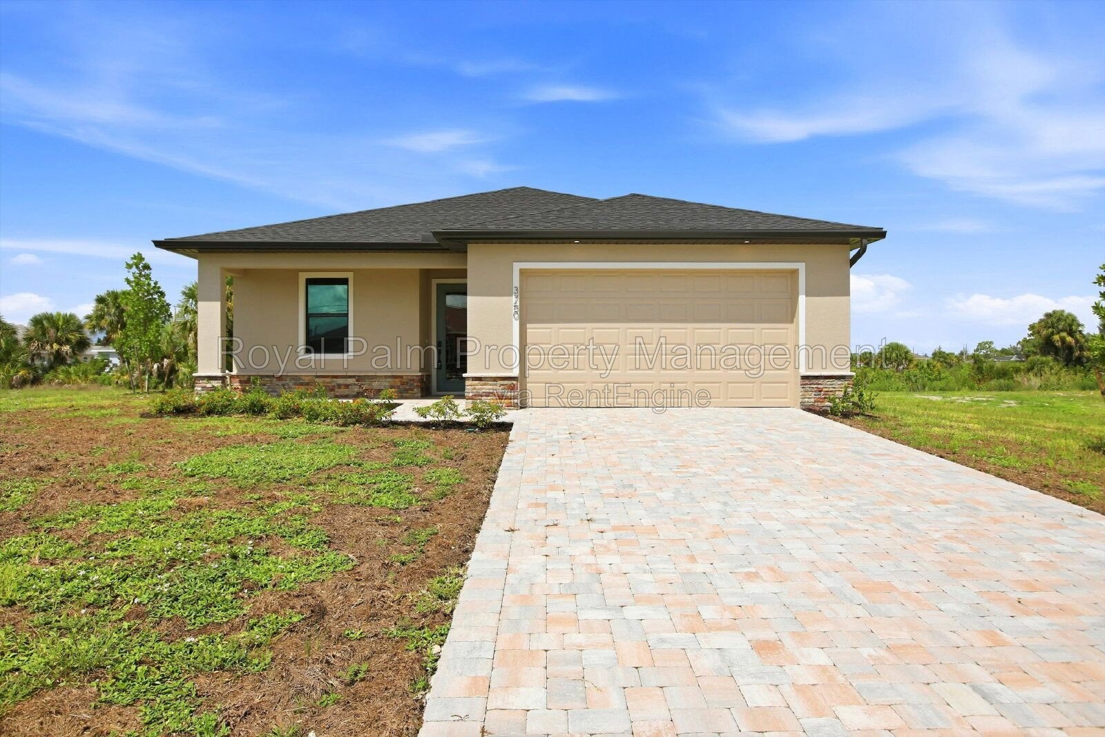 New 3/2 Pool Home for Rent on Canal, Fenced Yard, Pets Welcome. Your Dog Approves of This Backyard property image