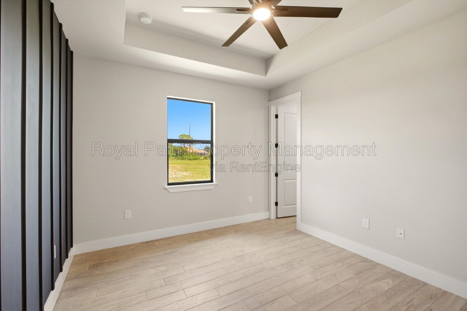 New 3/2 Pool Home for Rent on Canal, Fenced Yard, Pets Welcome. Your Dog Approves of This Backyard property image
