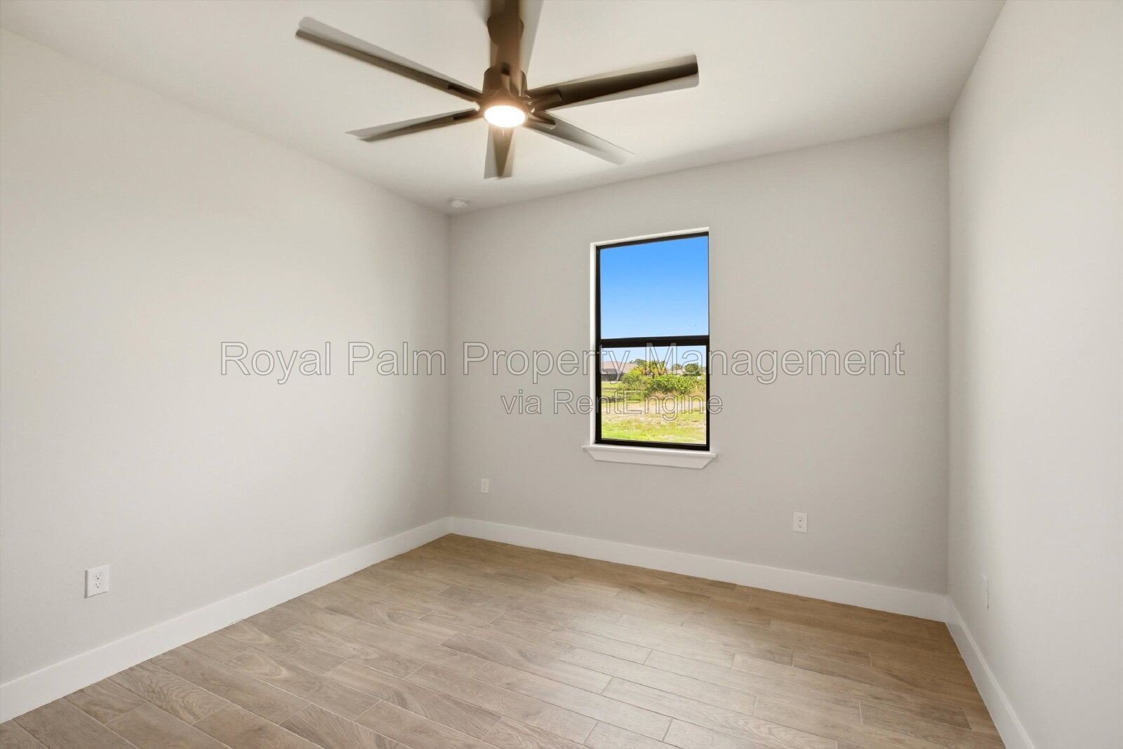 New 3/2 Pool Home for Rent on Canal, Fenced Yard, Pets Welcome. Your Dog Approves of This Backyard property image