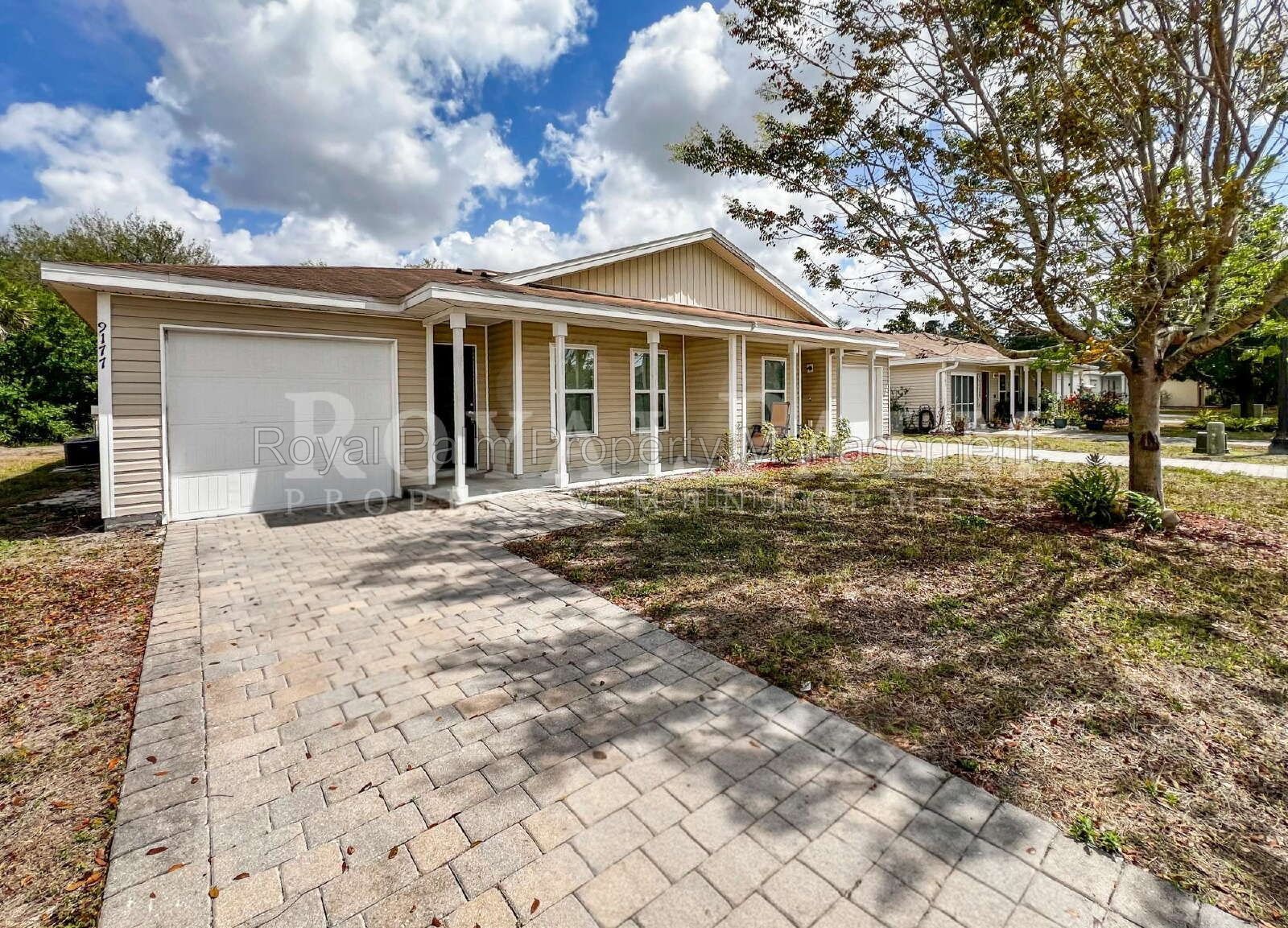 4 Bed / 2 Bath in Gated Vistanna Villas – Comes with Washer, Dryer, and Good Decisions - 9177 Aegean Circle, Lehigh Acres, FL property image
