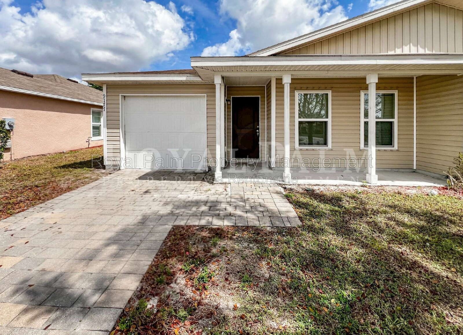4 Bed / 2 Bath in Gated Vistanna Villas – Comes with Washer, Dryer, and Good Decisions - 9177 Aegean Circle, Lehigh Acres, FL property image