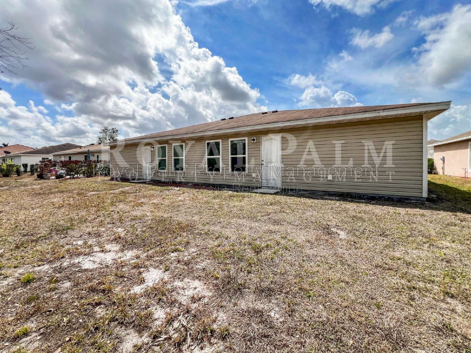 4 Bed / 2 Bath in Gated Vistanna Villas – Comes with Washer, Dryer, and Good Decisions - 9177 Aegean Circle, Lehigh Acres, FL property image