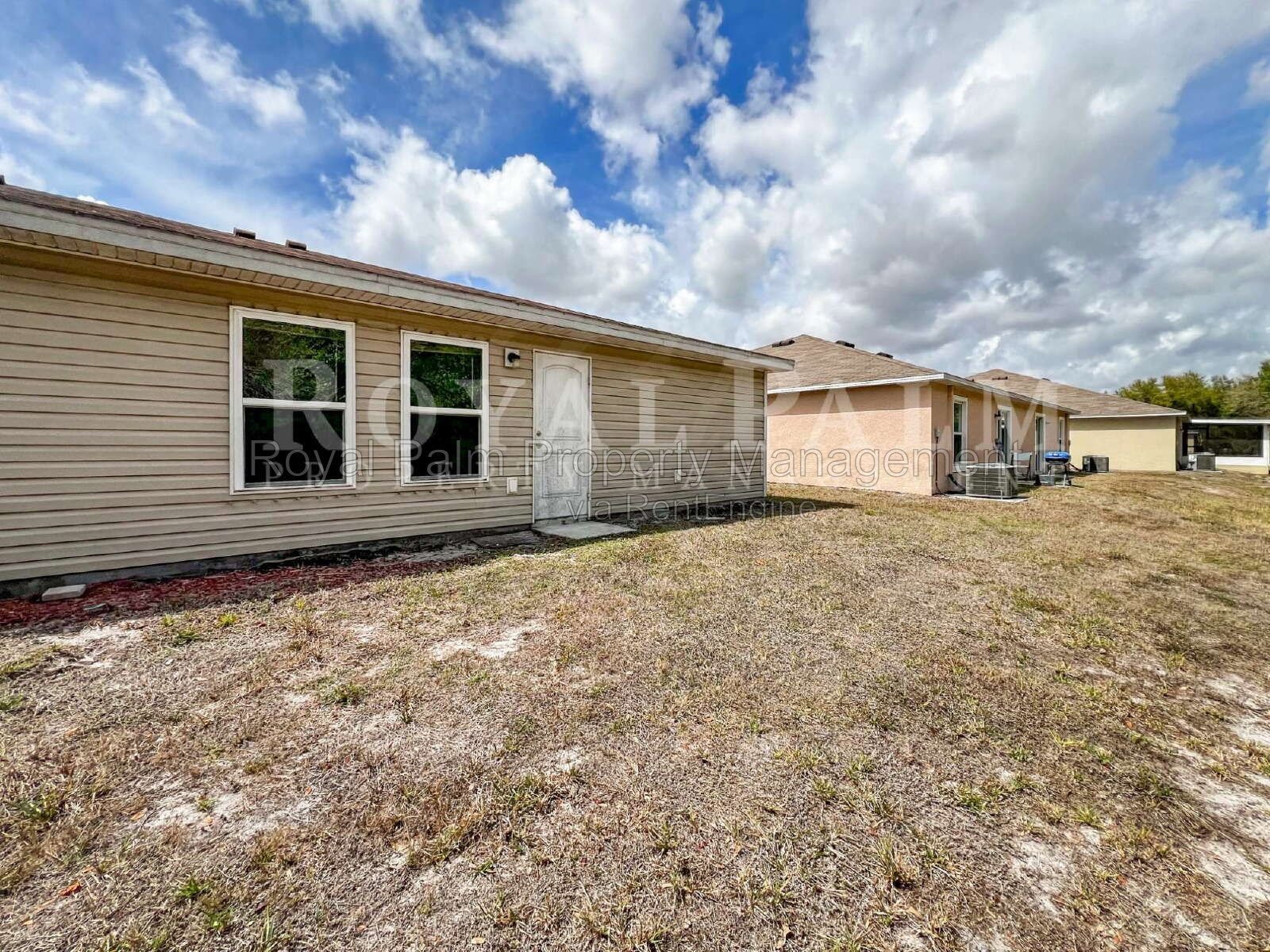 4 Bed / 2 Bath in Gated Vistanna Villas – Comes with Washer, Dryer, and Good Decisions - 9177 Aegean Circle, Lehigh Acres, FL property image