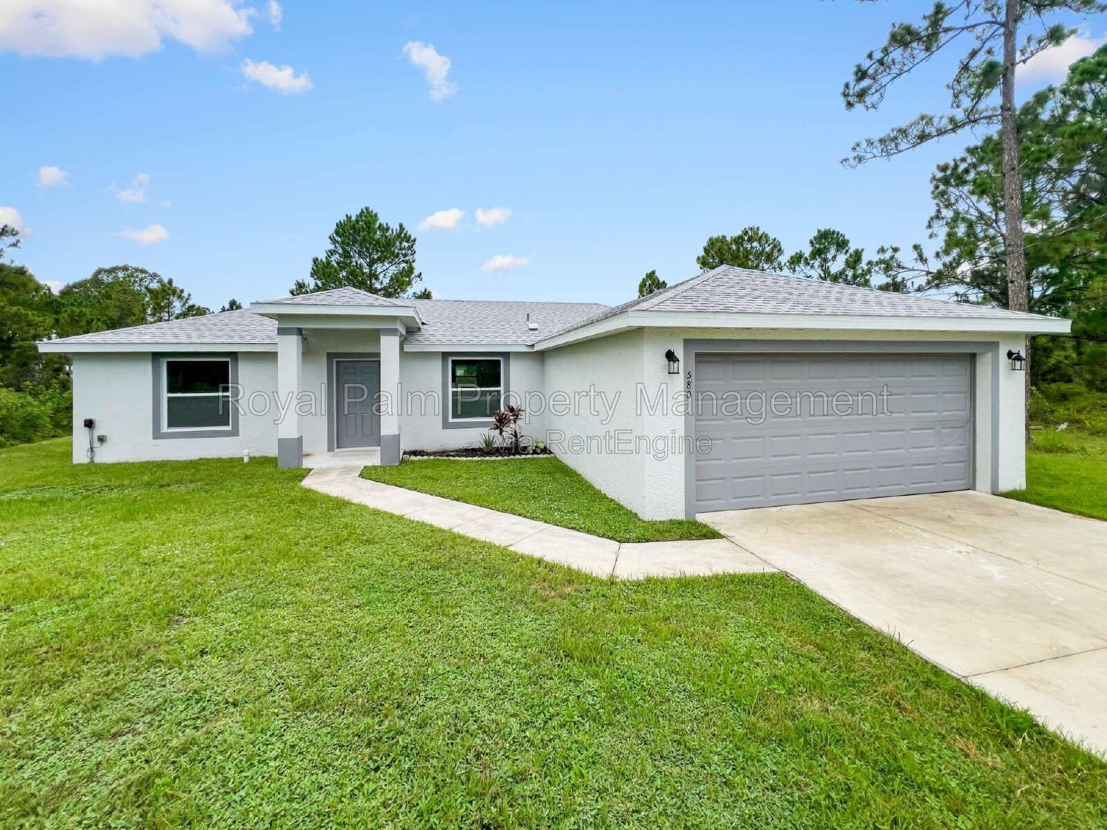 3 Bed, 2 Bath Lehigh Acres Home with Stainless Steel, Ceiling Fans, and a Garage You Won't Have to Share property image