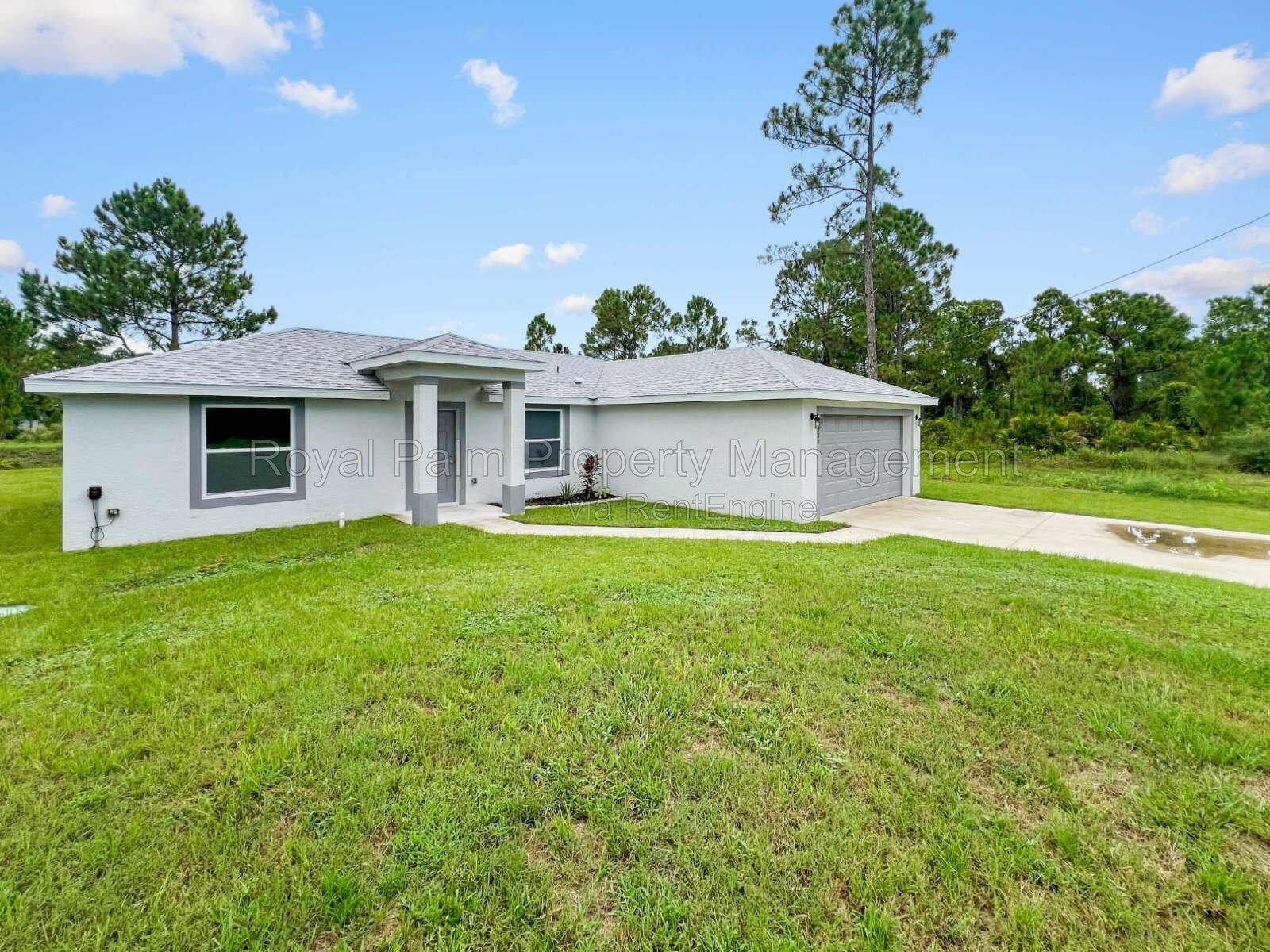 3 Bed, 2 Bath Lehigh Acres Home with Stainless Steel, Ceiling Fans, and a Garage You Won't Have to Share property image
