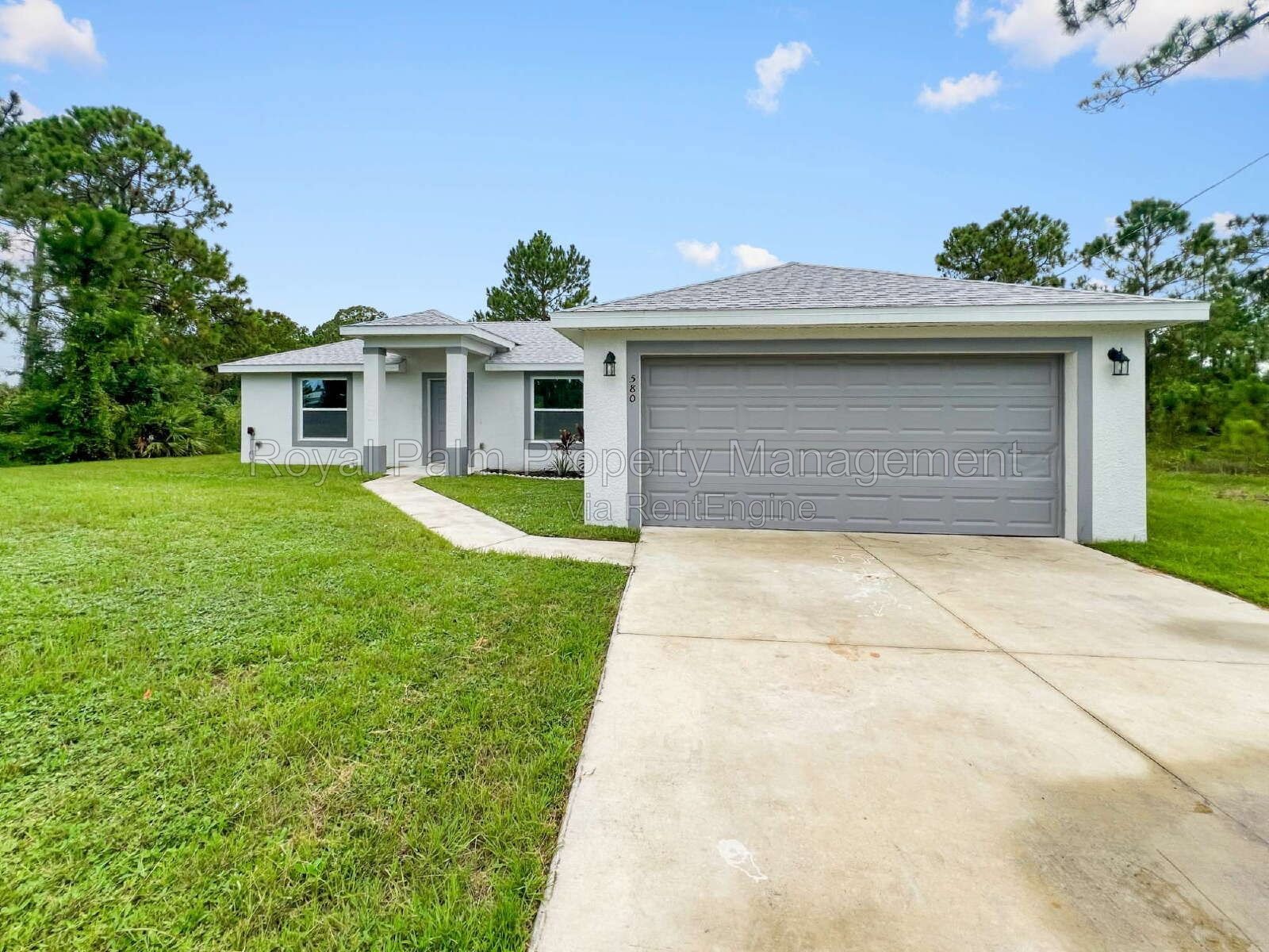 3 Bed, 2 Bath Lehigh Acres Home with Stainless Steel, Ceiling Fans, and a Garage You Won't Have to Share property image