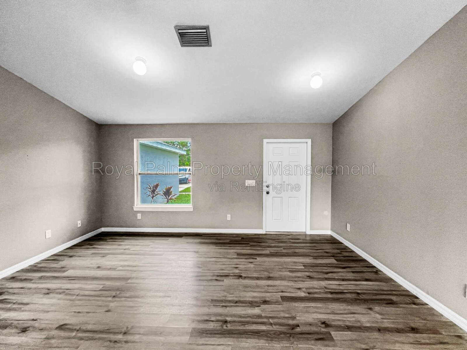 3 Bed, 2 Bath Lehigh Acres Home with Stainless Steel, Ceiling Fans, and a Garage You Won't Have to Share property image
