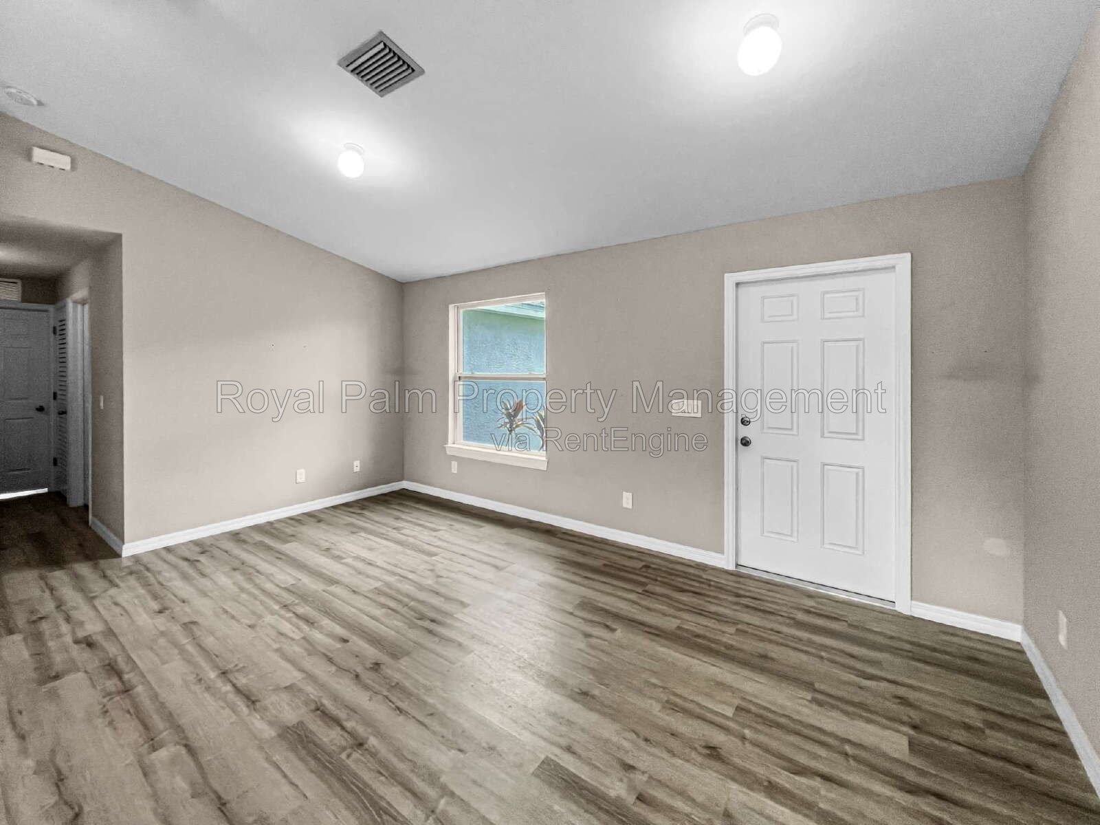 3 Bed, 2 Bath Lehigh Acres Home with Stainless Steel, Ceiling Fans, and a Garage You Won't Have to Share property image