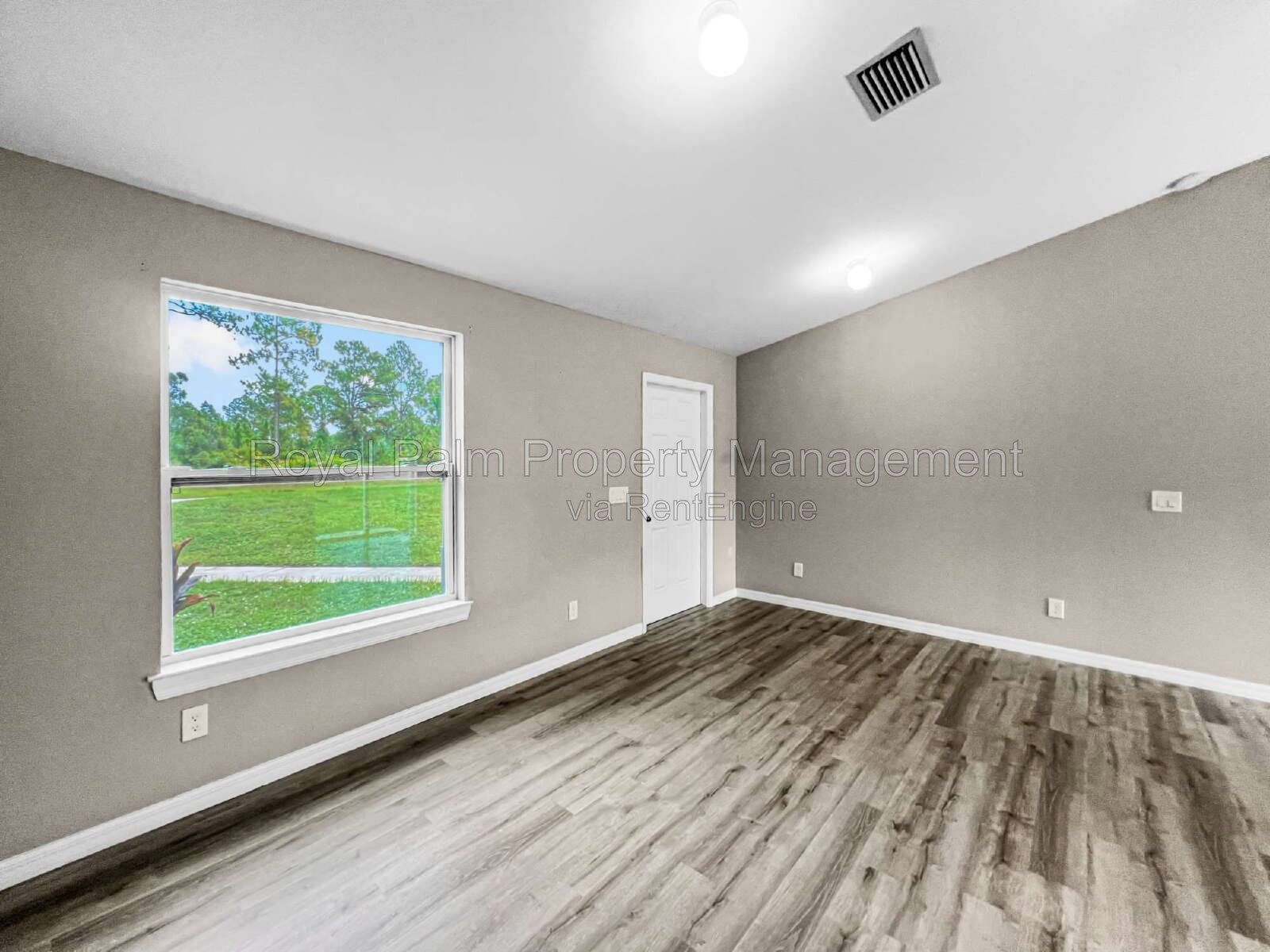 3 Bed, 2 Bath Lehigh Acres Home with Stainless Steel, Ceiling Fans, and a Garage You Won't Have to Share property image