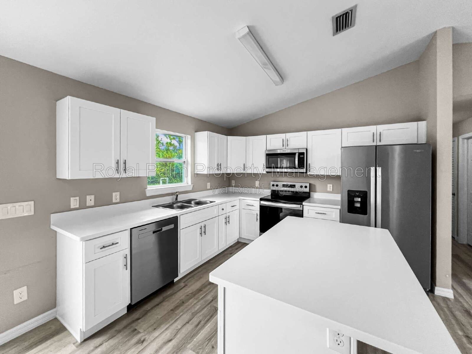 3 Bed, 2 Bath Lehigh Acres Home with Stainless Steel, Ceiling Fans, and a Garage You Won't Have to Share property image