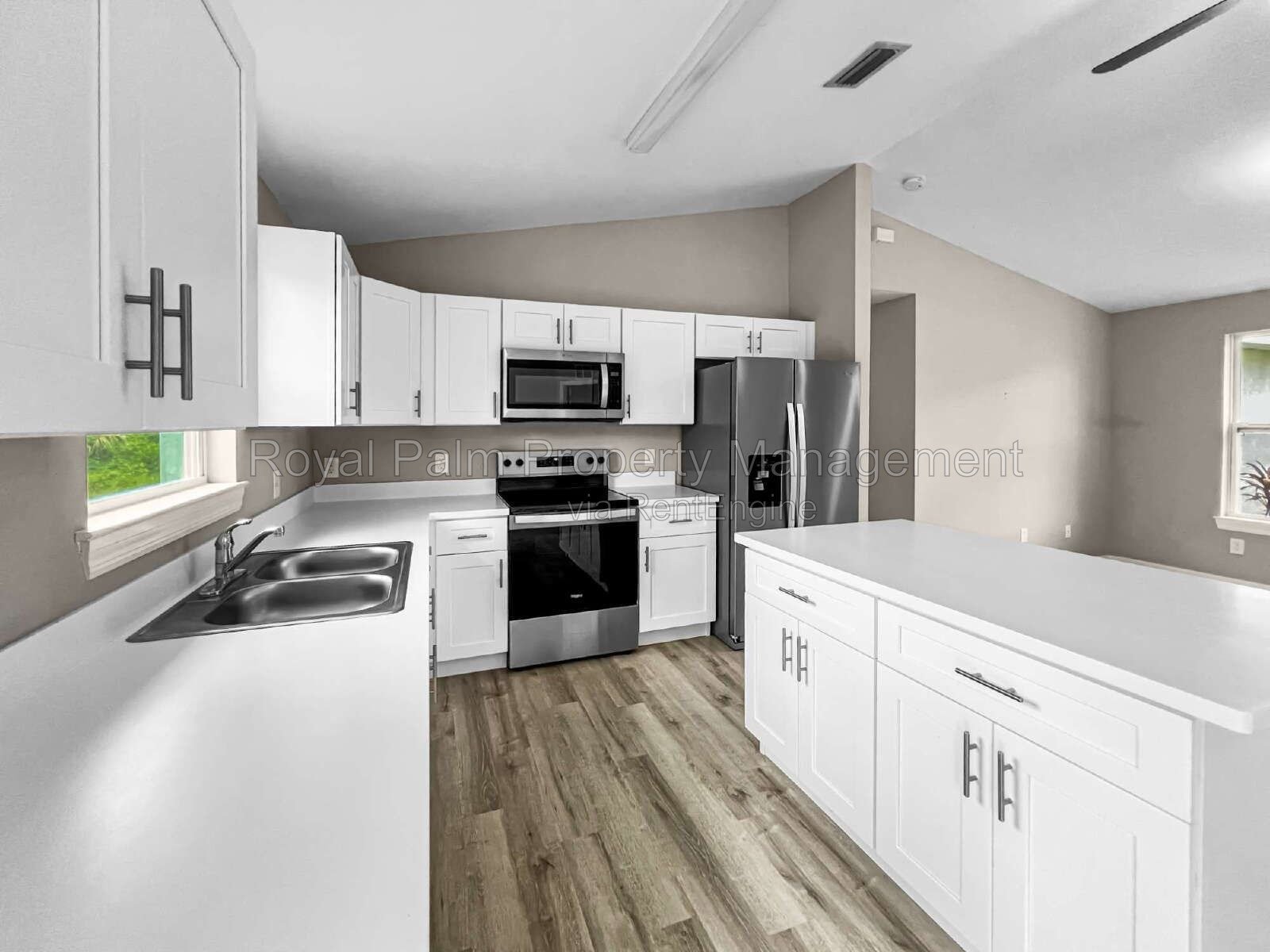 3 Bed, 2 Bath Lehigh Acres Home with Stainless Steel, Ceiling Fans, and a Garage You Won't Have to Share property image