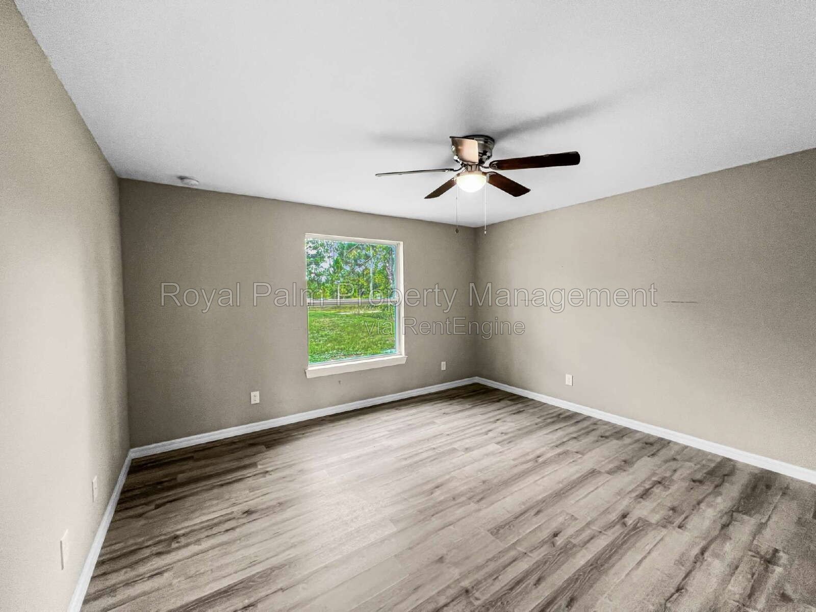 3 Bed, 2 Bath Lehigh Acres Home with Stainless Steel, Ceiling Fans, and a Garage You Won't Have to Share property image