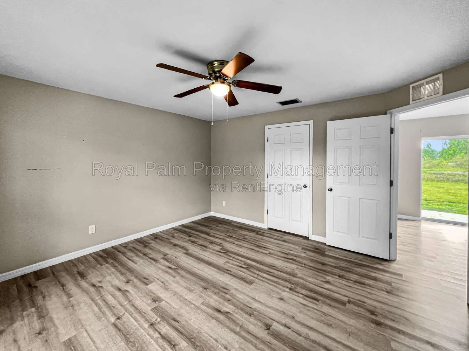 3 Bed, 2 Bath Lehigh Acres Home with Stainless Steel, Ceiling Fans, and a Garage You Won't Have to Share property image