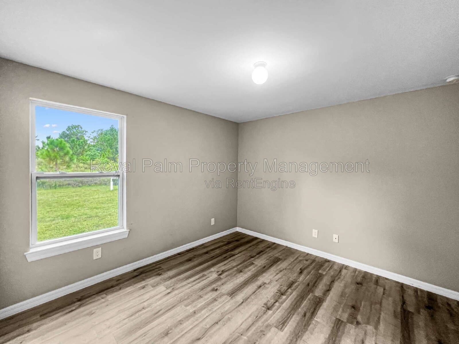 3 Bed, 2 Bath Lehigh Acres Home with Stainless Steel, Ceiling Fans, and a Garage You Won't Have to Share property image
