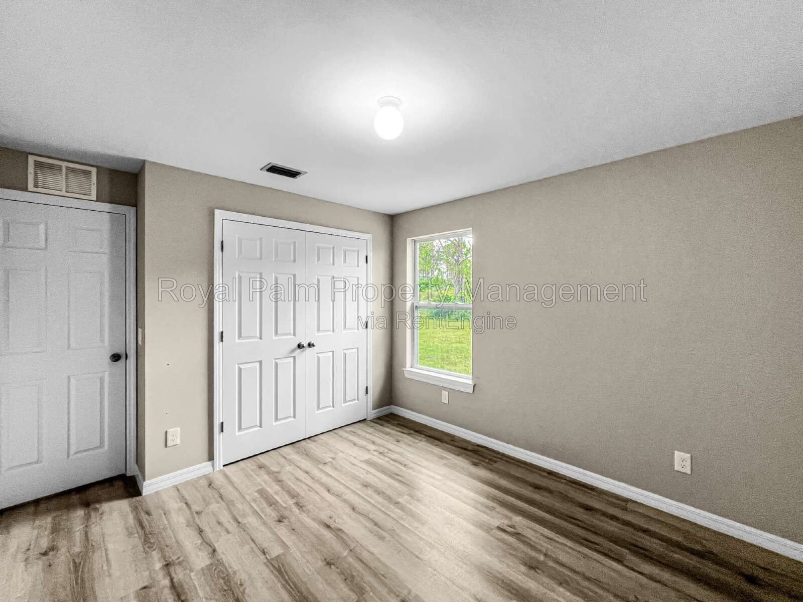 3 Bed, 2 Bath Lehigh Acres Home with Stainless Steel, Ceiling Fans, and a Garage You Won't Have to Share property image