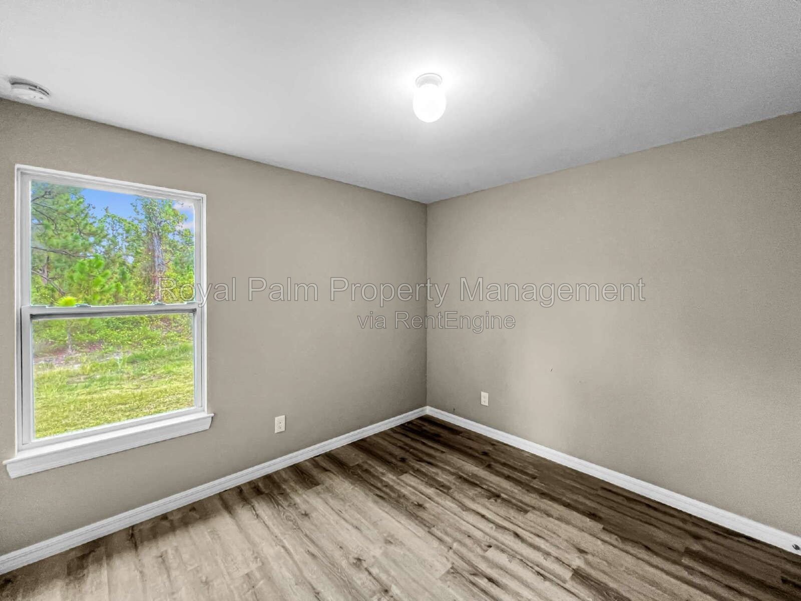 3 Bed, 2 Bath Lehigh Acres Home with Stainless Steel, Ceiling Fans, and a Garage You Won't Have to Share property image