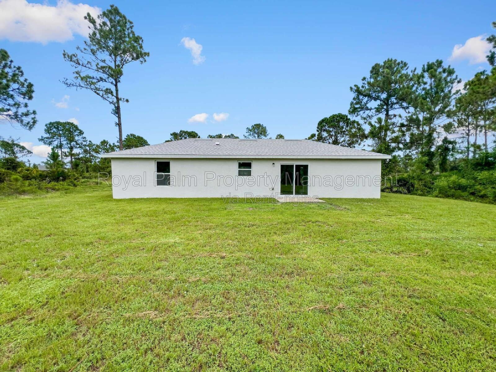 3 Bed, 2 Bath Lehigh Acres Home with Stainless Steel, Ceiling Fans, and a Garage You Won't Have to Share property image