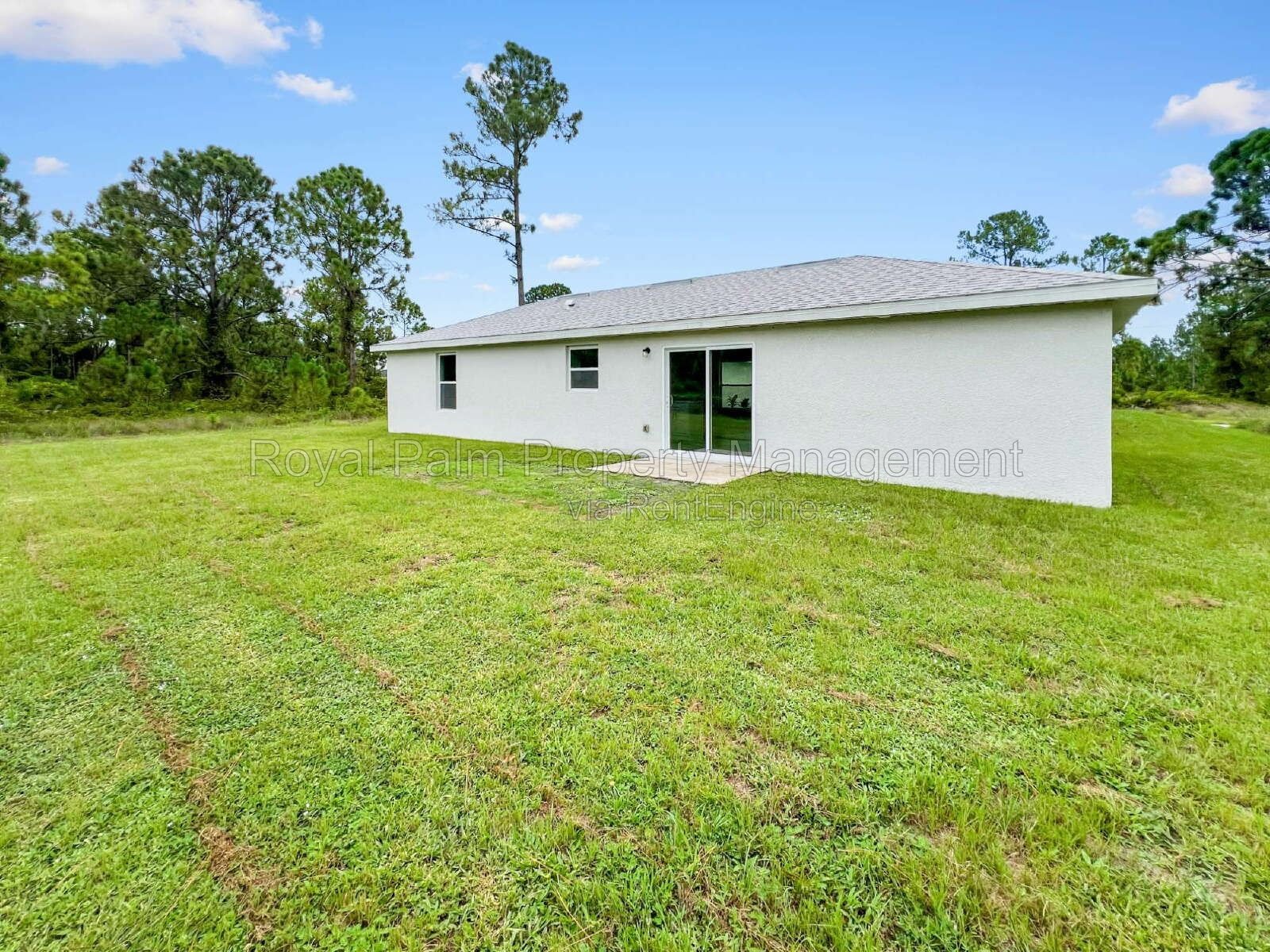 3 Bed, 2 Bath Lehigh Acres Home with Stainless Steel, Ceiling Fans, and a Garage You Won't Have to Share property image