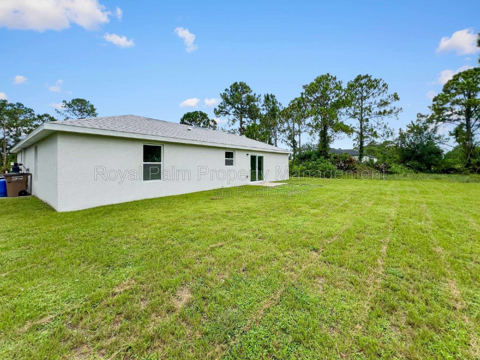 3 Bed, 2 Bath Lehigh Acres Home with Stainless Steel, Ceiling Fans, and a Garage You Won't Have to Share property image