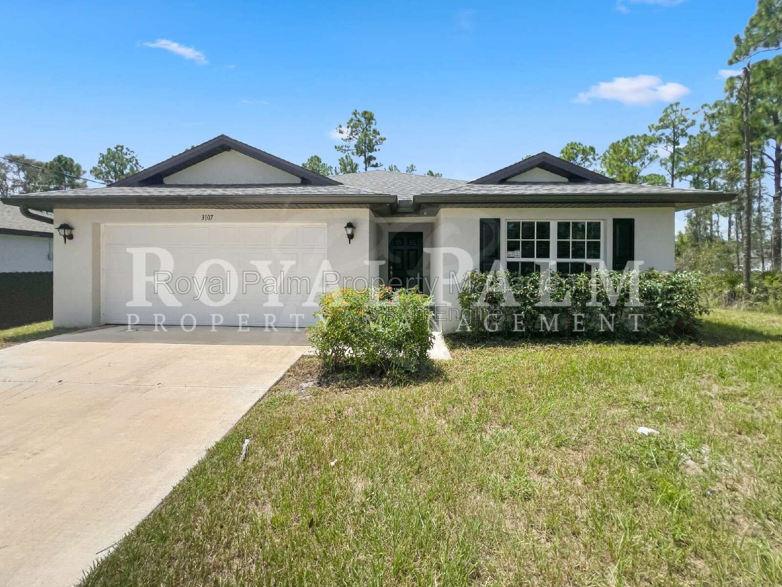 Laundry Room, 2-Car Garage, Room to Roam | 4-Bedroom Lehigh Acres Home property image