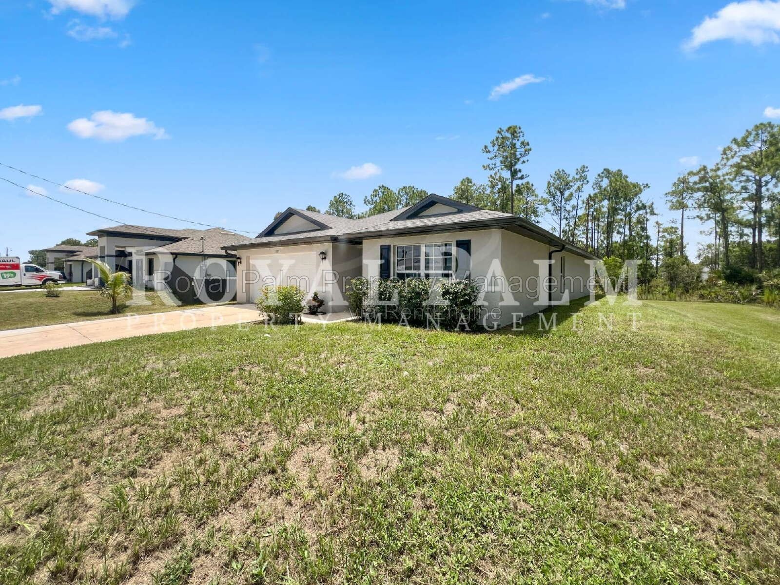 Laundry Room, 2-Car Garage, Room to Roam | 4-Bedroom Lehigh Acres Home property image