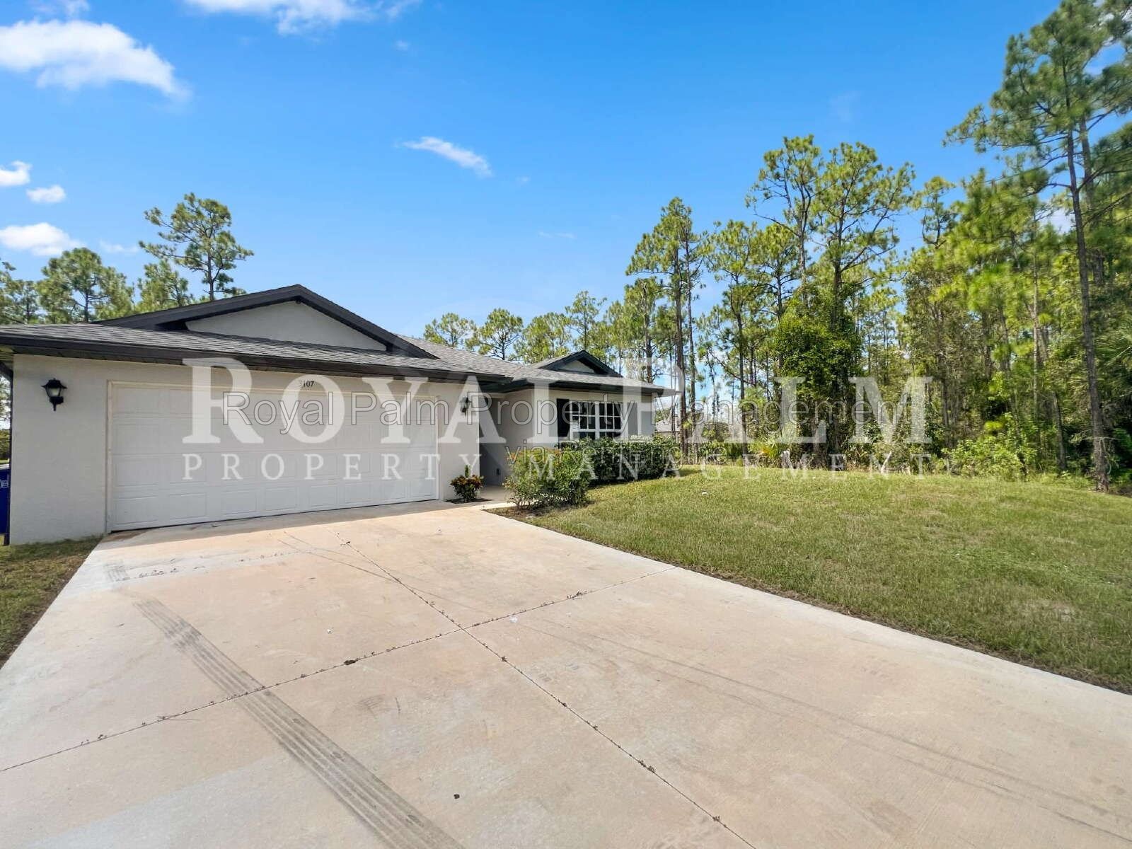 Laundry Room, 2-Car Garage, Room to Roam | 4-Bedroom Lehigh Acres Home property image