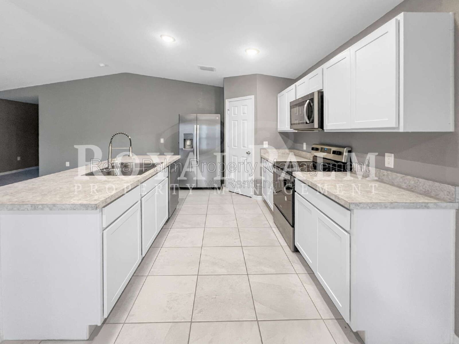 Laundry Room, 2-Car Garage, Room to Roam | 4-Bedroom Lehigh Acres Home property image