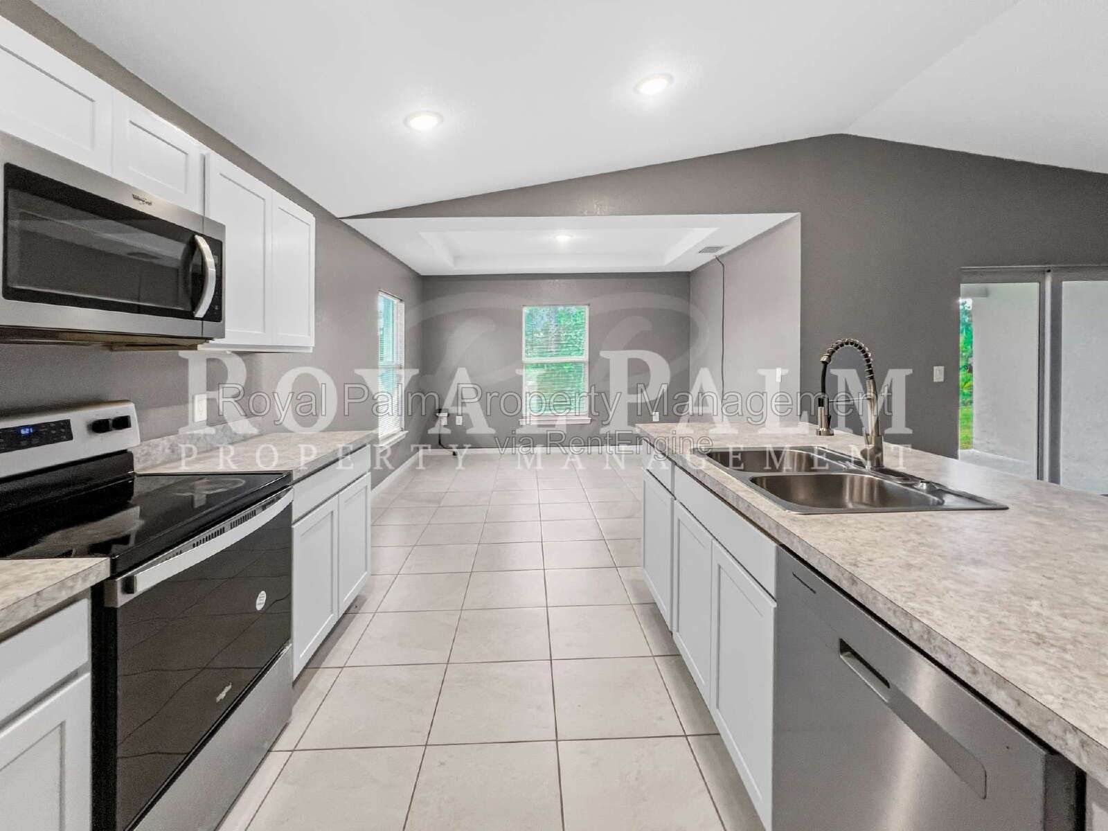 Laundry Room, 2-Car Garage, Room to Roam | 4-Bedroom Lehigh Acres Home property image