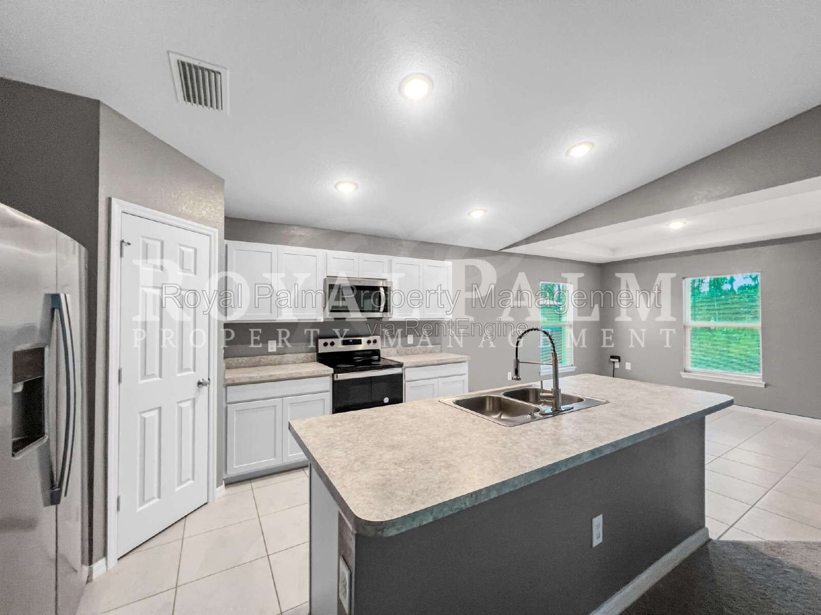 Laundry Room, 2-Car Garage, Room to Roam | 4-Bedroom Lehigh Acres Home property image
