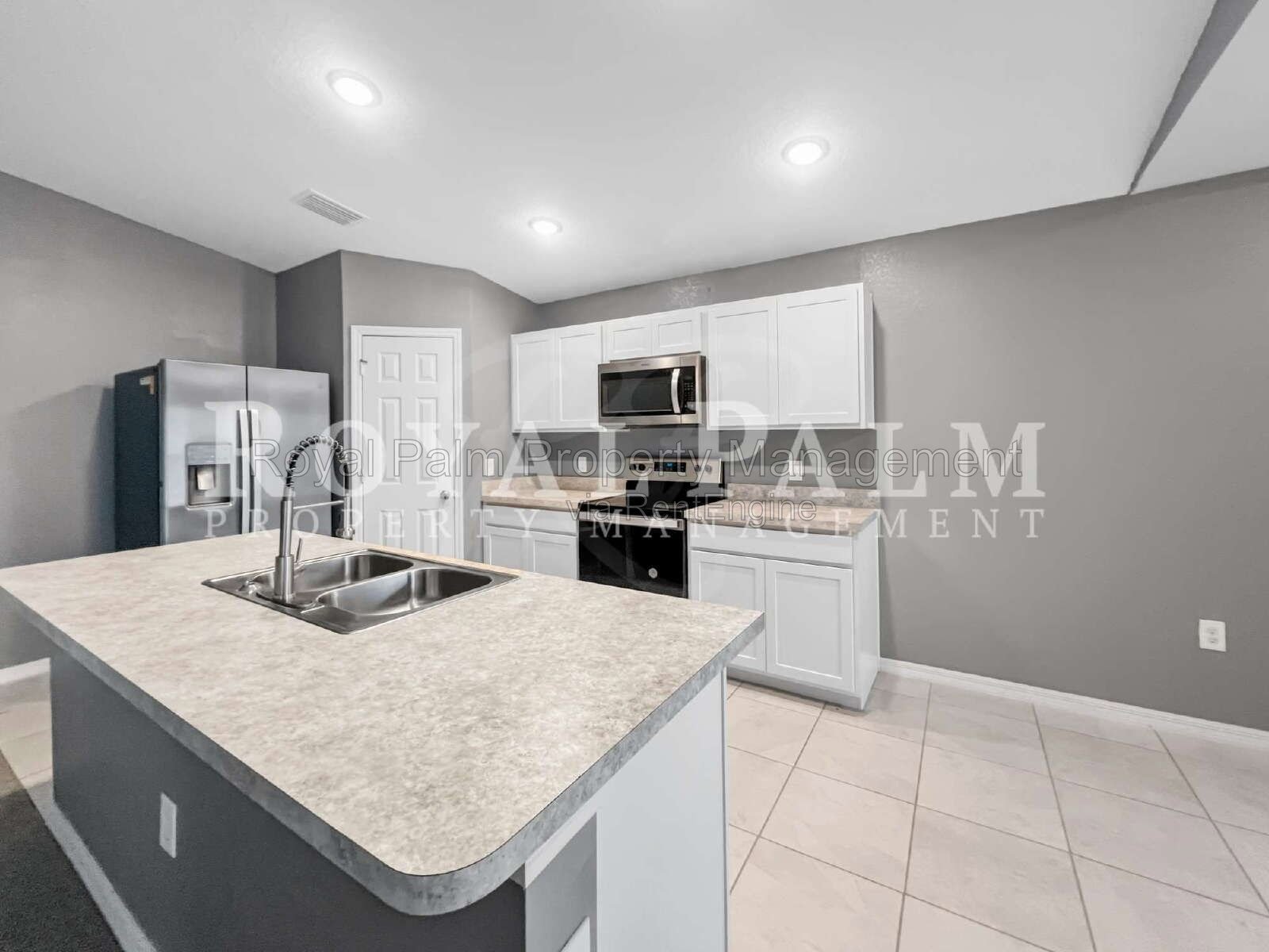 Laundry Room, 2-Car Garage, Room to Roam | 4-Bedroom Lehigh Acres Home property image