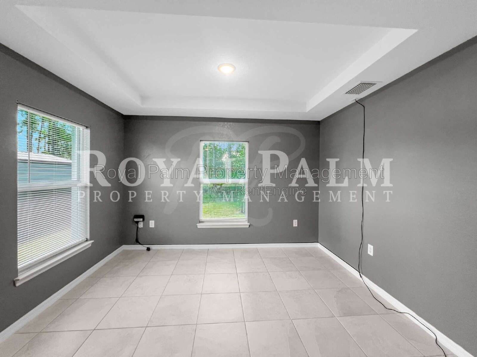 Laundry Room, 2-Car Garage, Room to Roam | 4-Bedroom Lehigh Acres Home property image