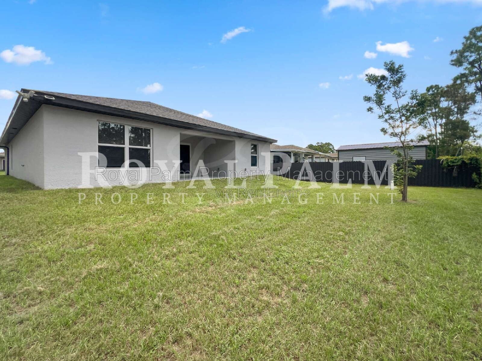 Laundry Room, 2-Car Garage, Room to Roam | 4-Bedroom Lehigh Acres Home property image
