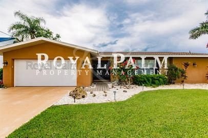3/2 Home with Gulf Access, Lawn, & Pool Included... Water You Waiting For! property image