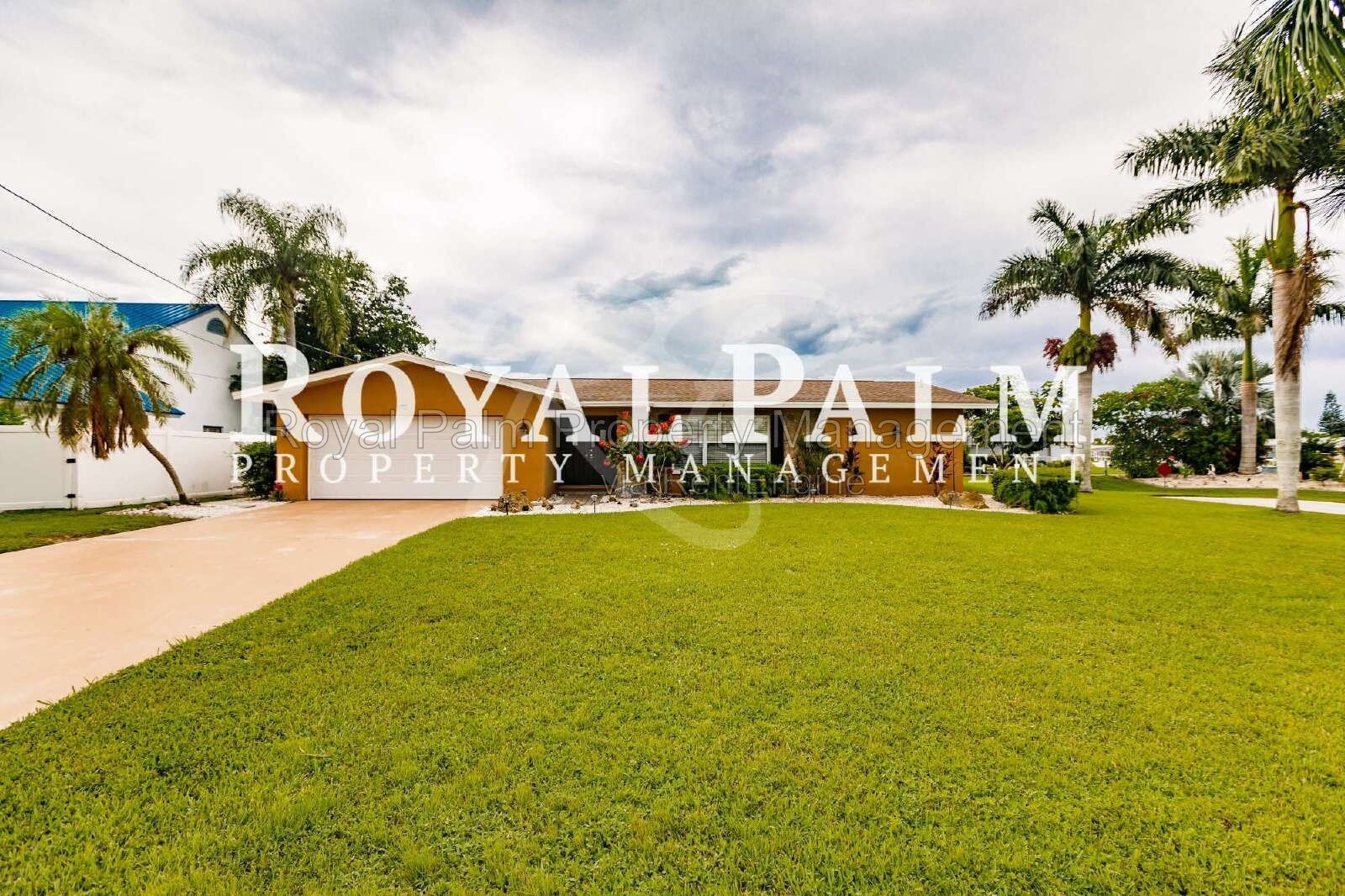 3/2 Home with Gulf Access, Lawn, & Pool Included... Water You Waiting For! property image