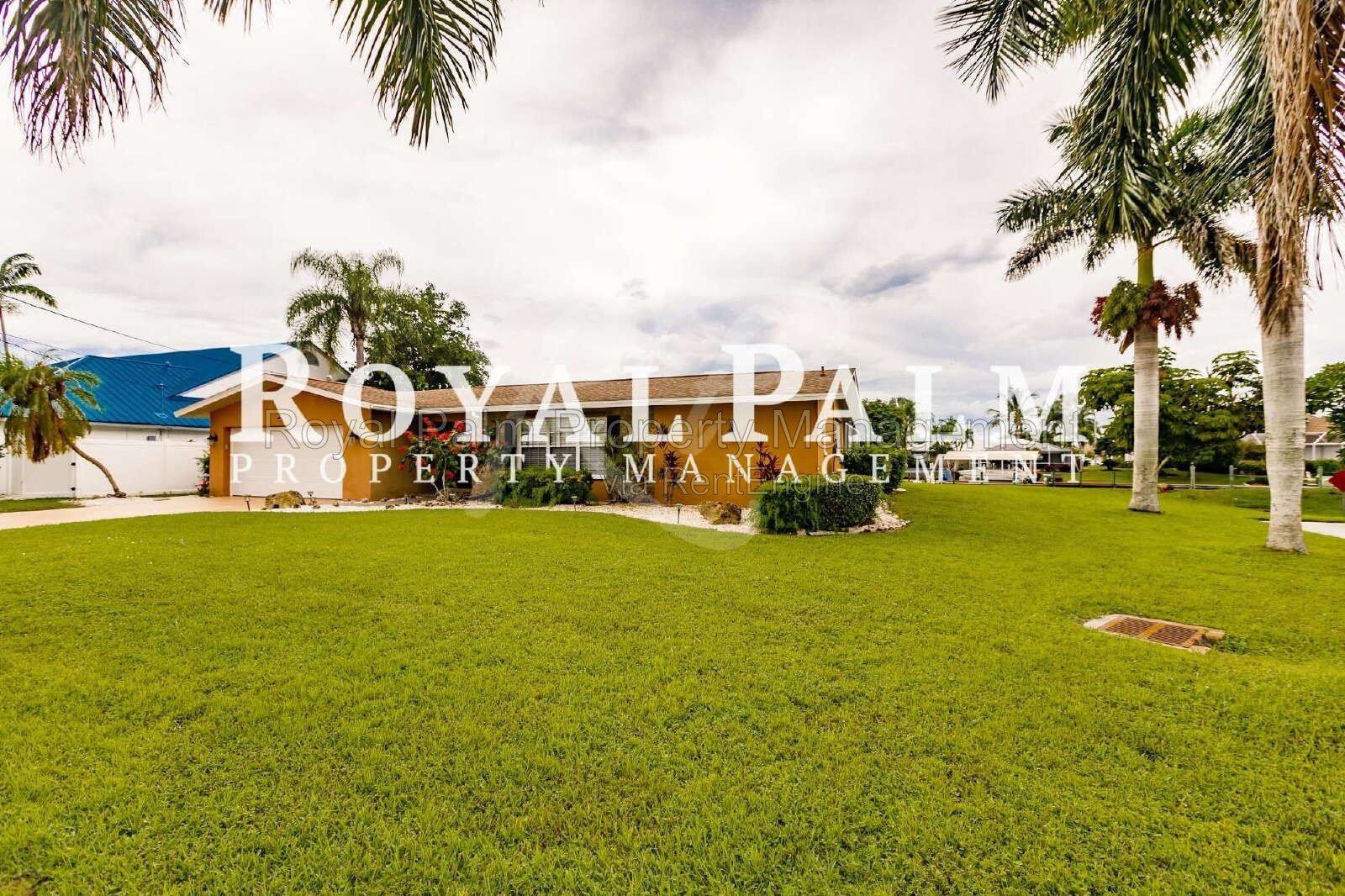 3/2 Home with Gulf Access, Lawn, & Pool Included... Water You Waiting For! property image