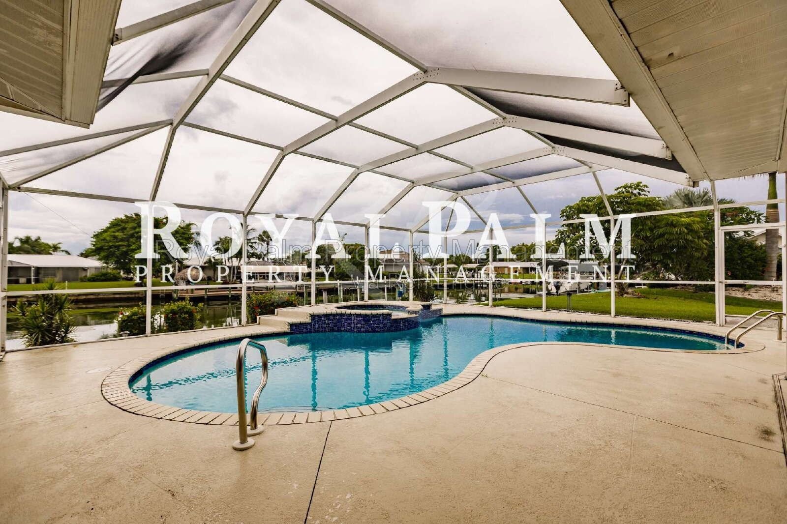 3/2 Home with Gulf Access, Lawn, & Pool Included... Water You Waiting For! property image