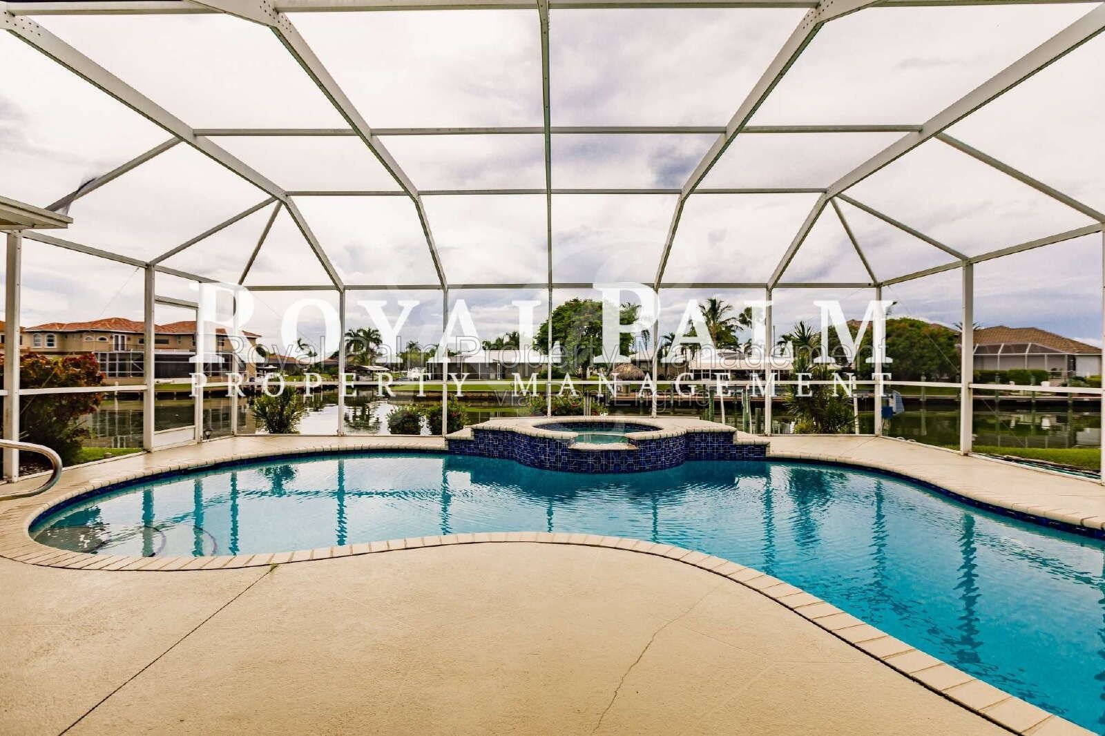 3/2 Home with Gulf Access, Lawn, & Pool Included... Water You Waiting For! property image