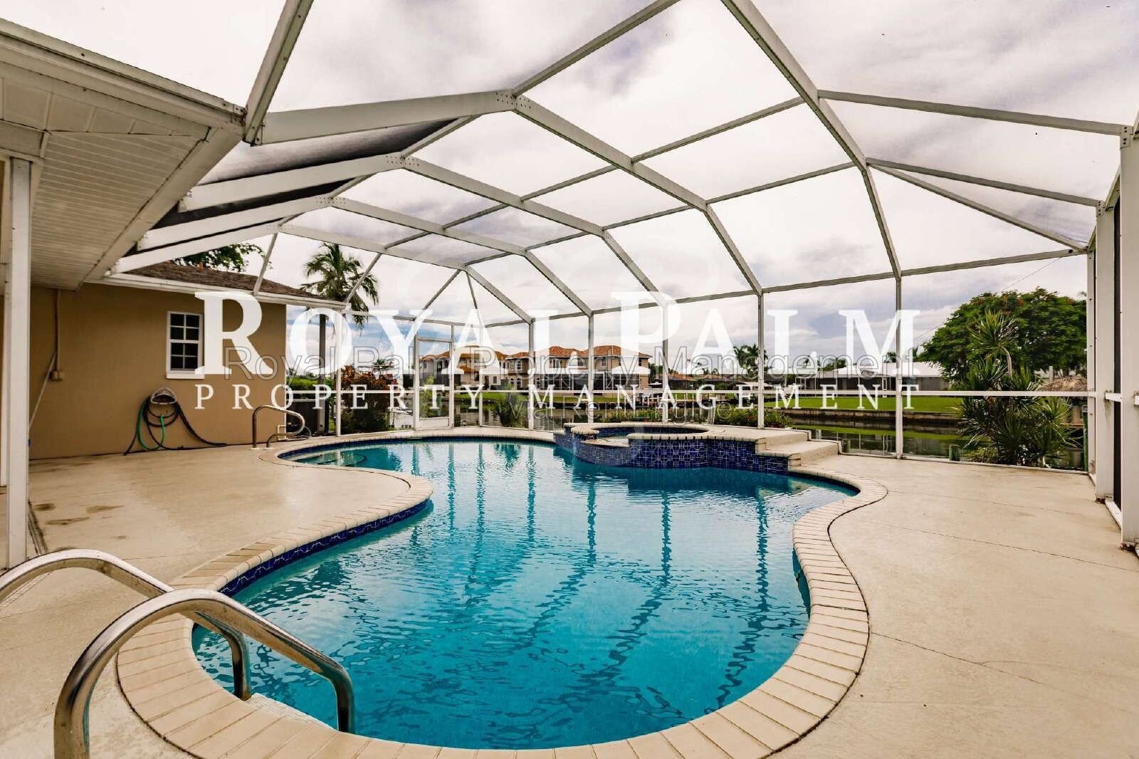 3/2 Home with Gulf Access, Lawn, & Pool Included... Water You Waiting For! property image