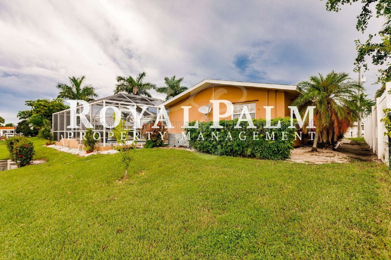3/2 Home with Gulf Access, Lawn, & Pool Included... Water You Waiting For! property image