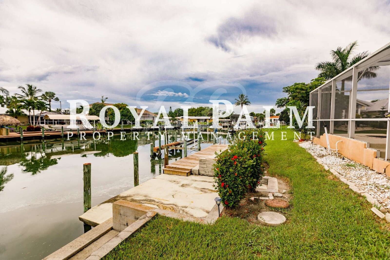 3/2 Home with Gulf Access, Lawn, & Pool Included... Water You Waiting For! property image