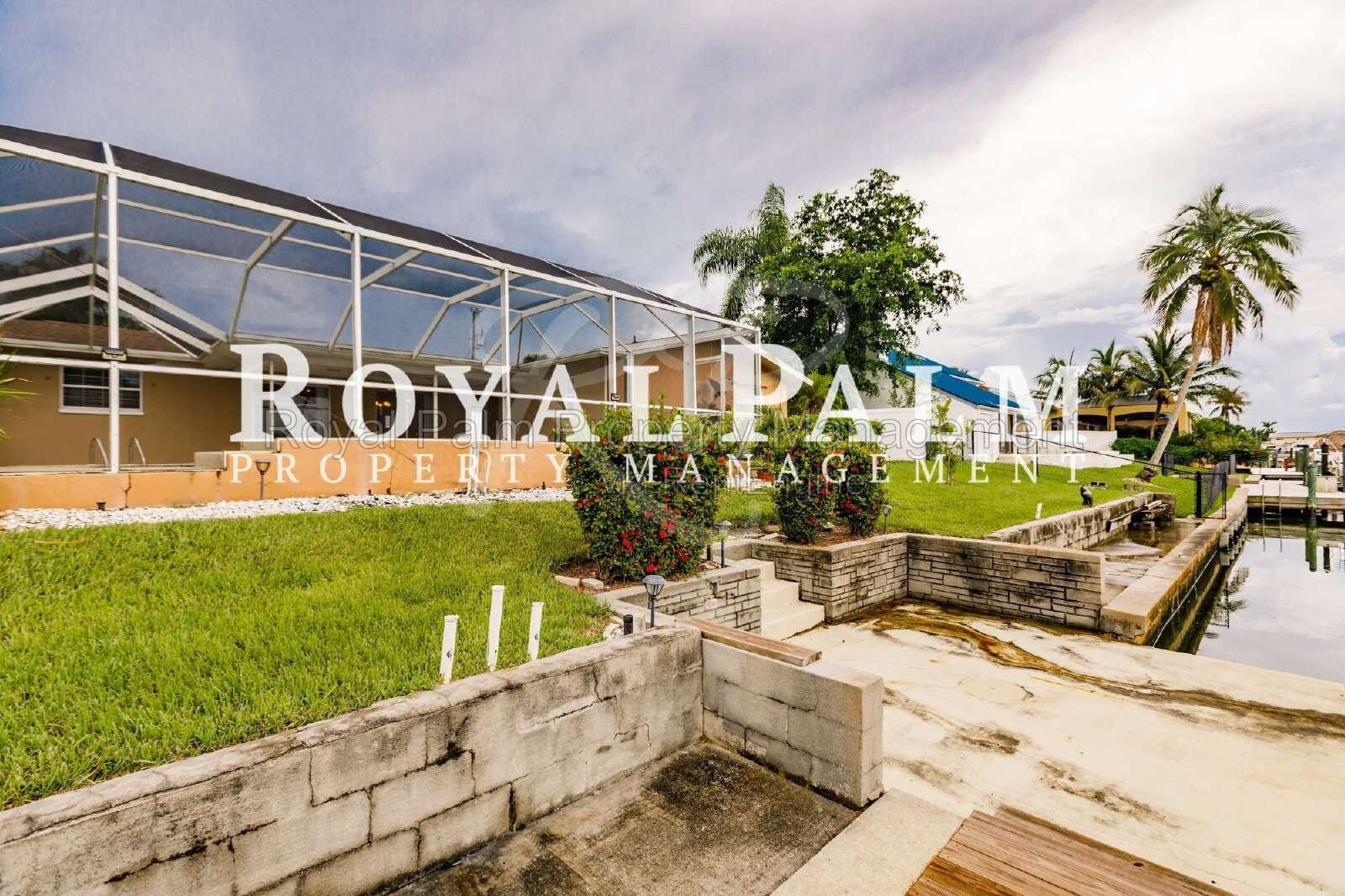 3/2 Home with Gulf Access, Lawn, & Pool Included... Water You Waiting For! property image