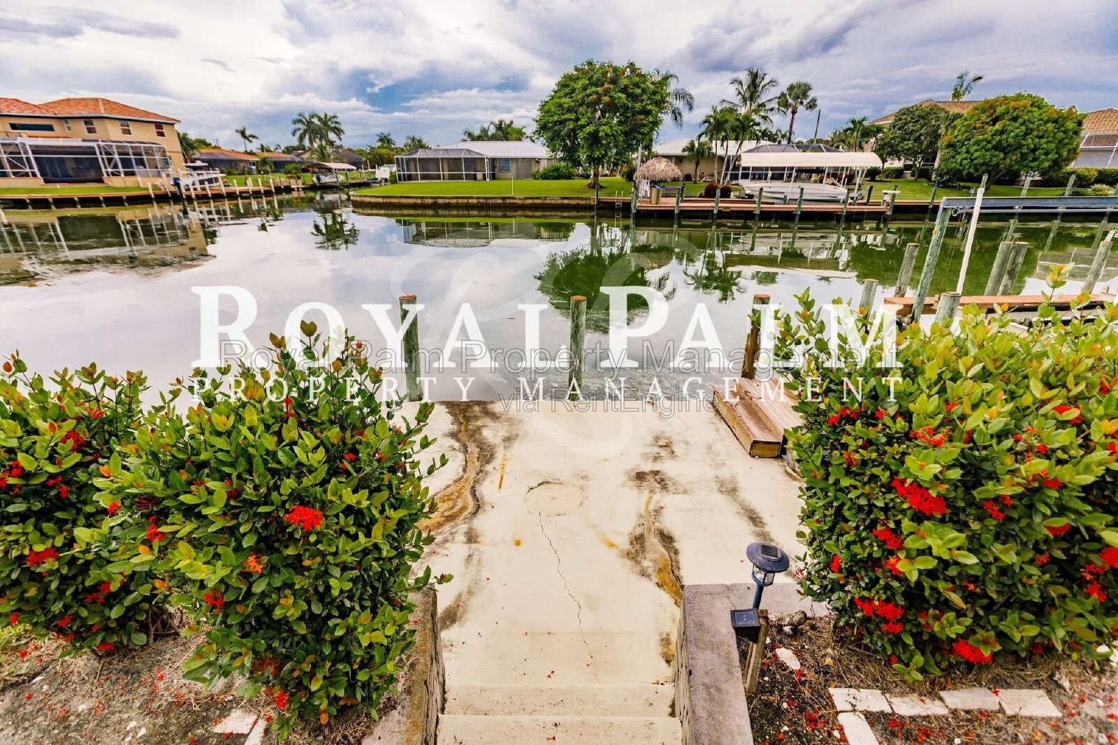 3/2 Home with Gulf Access, Lawn, & Pool Included... Water You Waiting For! property image