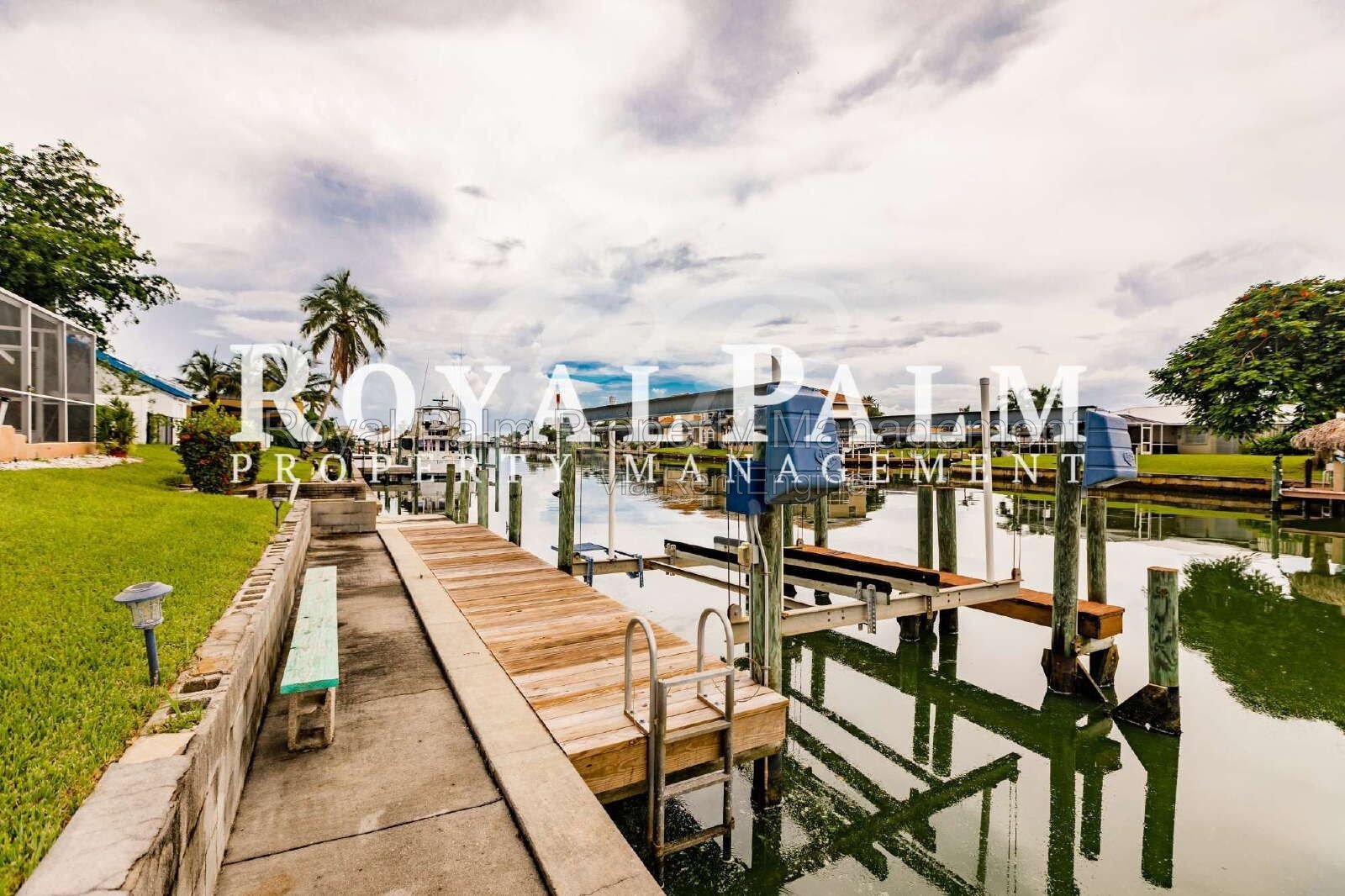 3/2 Home with Gulf Access, Lawn, & Pool Included... Water You Waiting For! property image