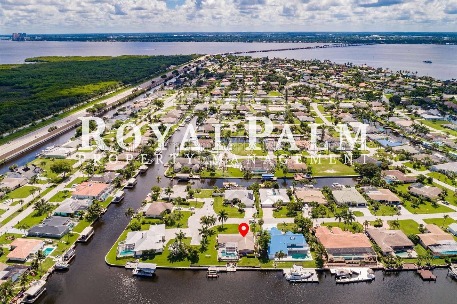 3/2 Home with Gulf Access, Lawn, & Pool Included... Water You Waiting For! property image