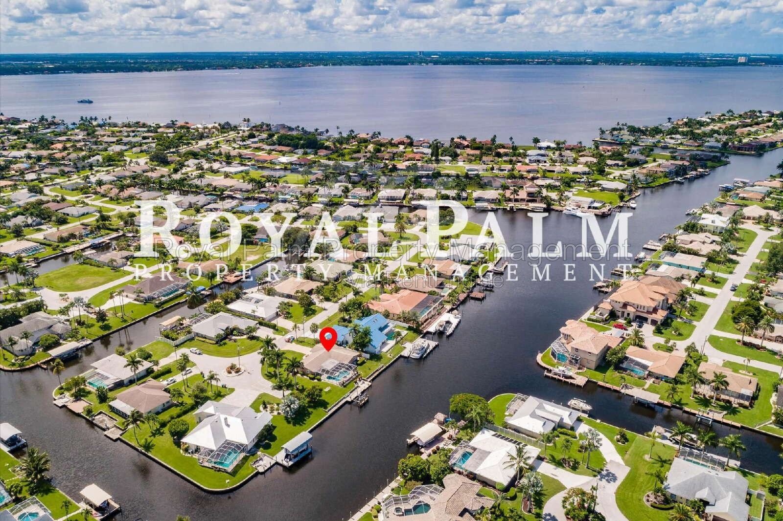 3/2 Home with Gulf Access, Lawn, & Pool Included... Water You Waiting For! property image