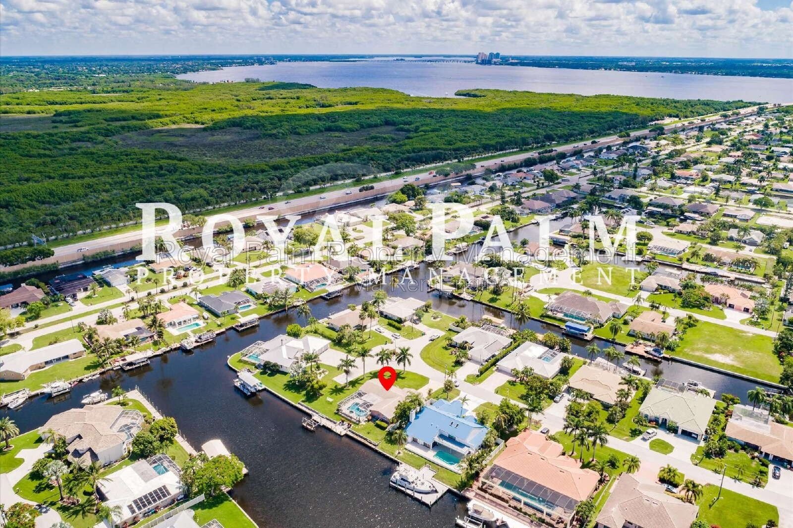 3/2 Home with Gulf Access, Lawn, & Pool Included... Water You Waiting For! property image
